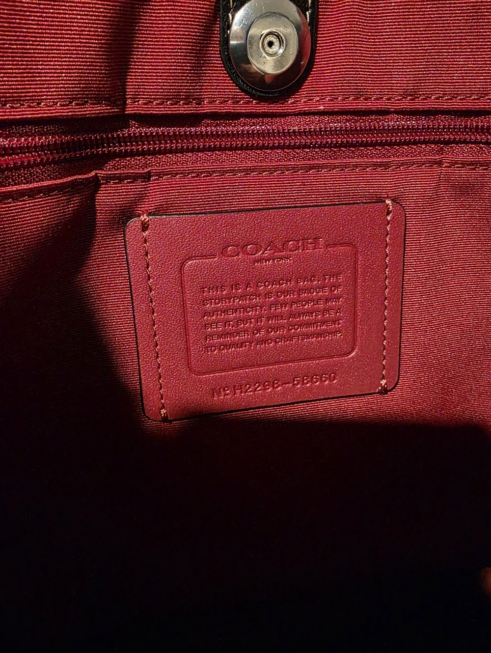 Coach Derby Tote Bag in black pebbled leather with a contrasting red interior. - Picture 8 of 11